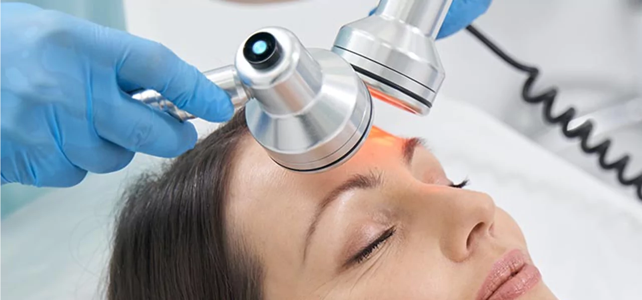 A woman undergoing a dermal fillers treatment on her face, focused on skincare and beauty enhancement.